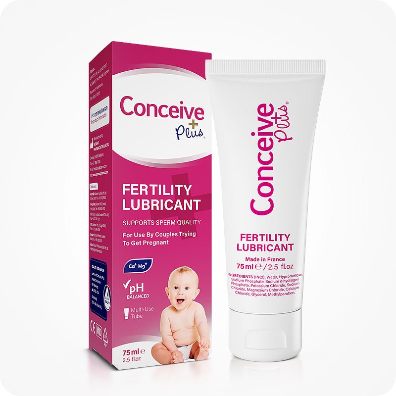Fertility Lubricant 75ml image showing Conceive Plus UK box and tube on white background, with the dark pink box on the left and white tube on the right featuring pink branding and a baby image on the box.