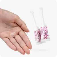 Max Fertility Lubricant Bundle featuring images of two 4g pre-filled applicators and clear gel shown on hand for texture and application scale. White applicators have pink branding.