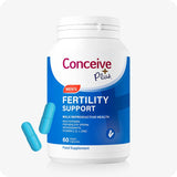 Conceive Plus Men’s Fertility Support supplement bottle on a white background with blue and white packaging, featuring two turquoise capsules beside the bottle. Designed to support male reproductive health, sperm quality, and antioxidant levels with vitamins C, E, and zinc.