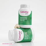 Two bottles of Conceive Plus morning sickness relief supplement on a white background