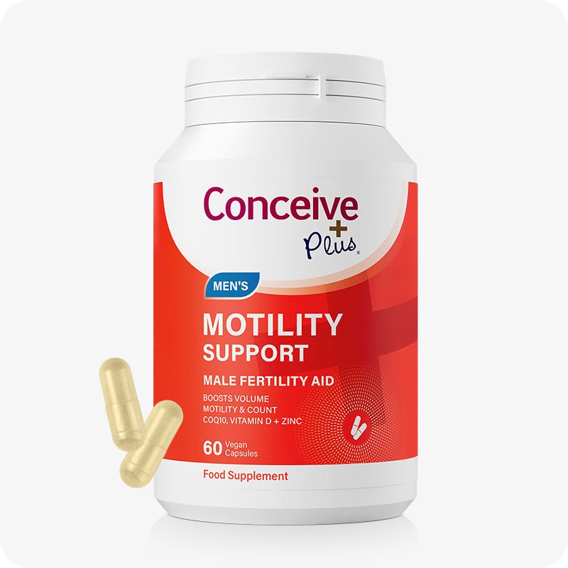 Conceive Plus Motility Support bottle for men on a white background with red and white label, highlighting 60 vegan capsules to boost sperm motility, volume, and count. Two light-yellow capsules are placed beside the bottle.
