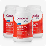 Three bottles of Conceive Plus Motility Support arranged in a triangle formation on a white background, featuring red and white packaging with blue highlights, designed for male fertility aid and promoting motility, volume, and sperm health.