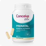 Conceive Plus Prenatal supplement bottle featuring teal and white label with gold trim, includes 60 vegan capsules containing essential nutrients like folate, choline, and DHA for pregnancy support, shown with two beige capsules on a white background.
