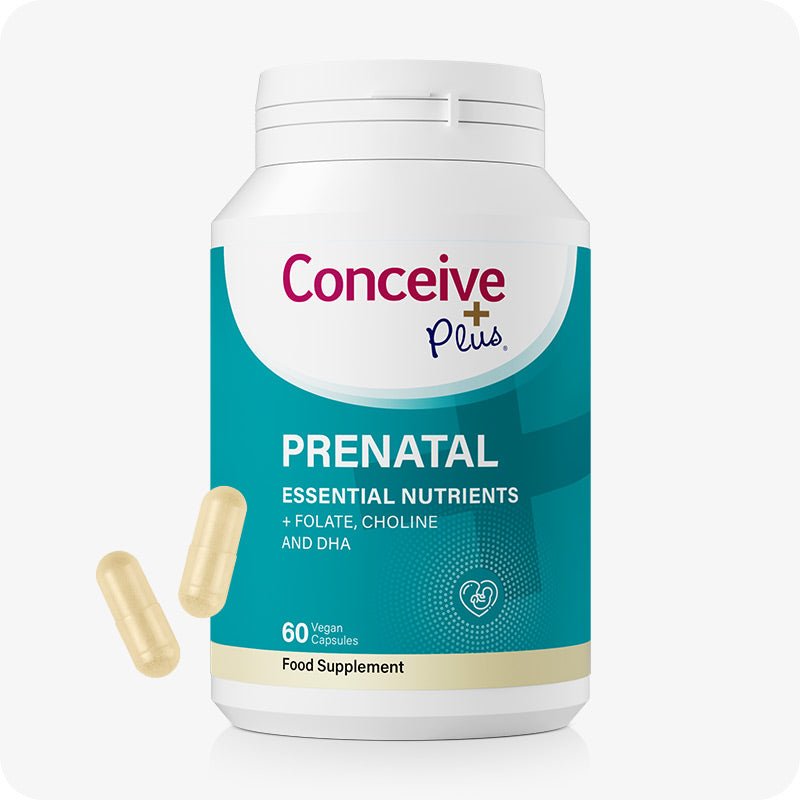 Conceive Plus Prenatal supplement bottle featuring teal and white label with gold trim, includes 60 vegan capsules containing essential nutrients like folate, choline, and DHA for pregnancy support, shown with two beige capsules on a white background.