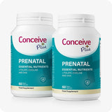 Two bottles of Conceive Plus Prenatal supplement with teal and white packaging, labeled "Essential Nutrients + Folate, Choline and DHA," each containing 60 vegan capsules for daily prenatal support.