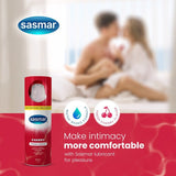 Sasmar lubricant bottle with couple in background on a red background