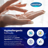 Hands holding a small container of lubricant with Sasmar branding and product features listed.