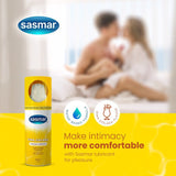 Sasmar lubricant packaging with a couple in the background, promoting comfort during intimacy.