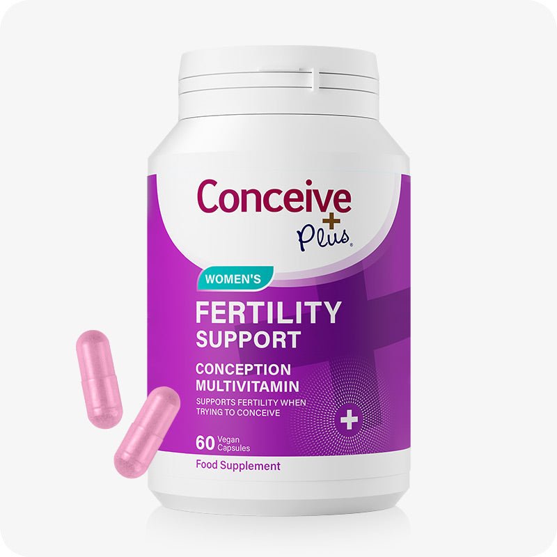 Conceive Plus Women’s Fertility Support bottle with purple and white label, featuring 60 pink vegan capsules for conception support.